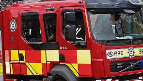 Elderly man rushed to hospital following house fire in Limerick
