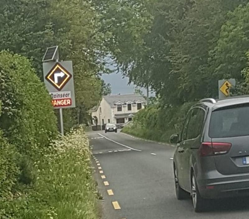 PICTURE Warnings signs erected on approach road to dangerous bends at