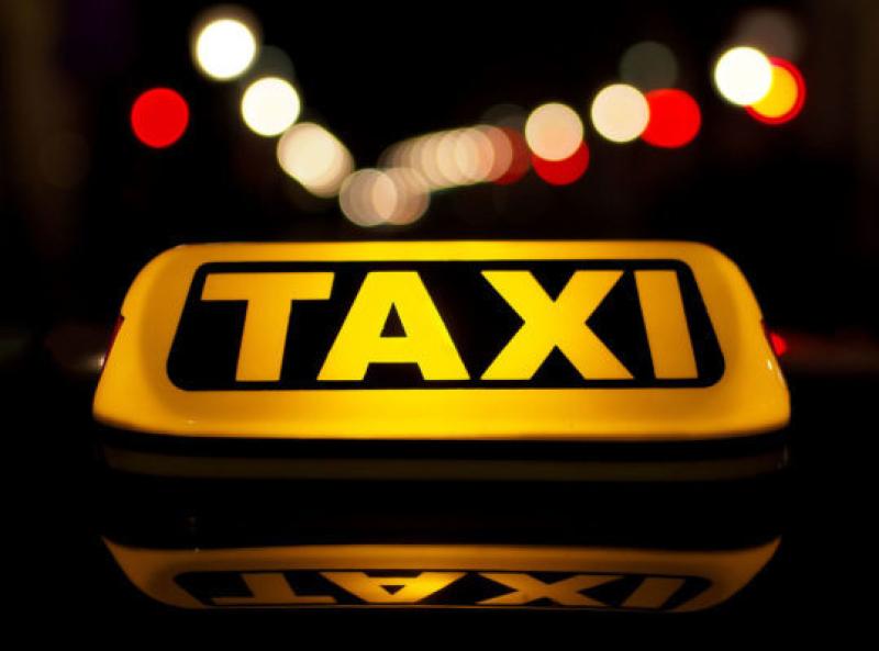 Taxi window smashed and car riffled through in Carlow