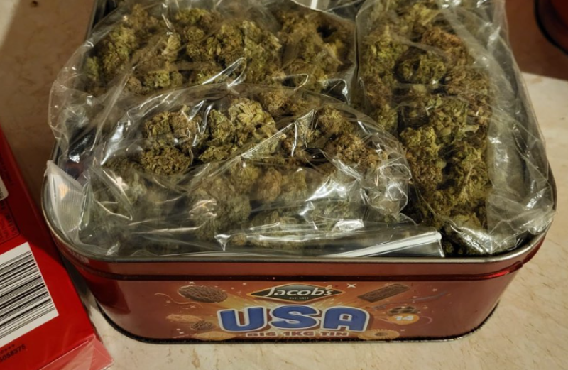 Gardaí arrest man after discovery of suspected cannabis haul in Cork biscuit tin