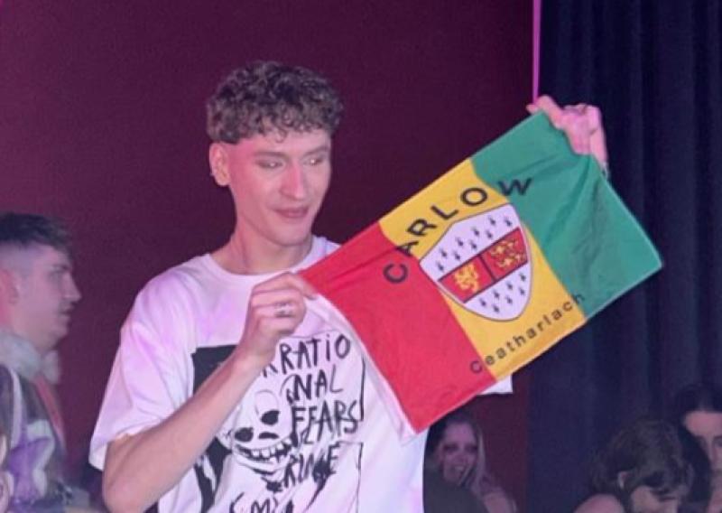 Social media reacts to Lithuanian Eurovision Contestant holding up a Carlow flag 