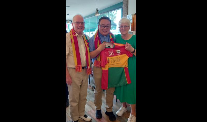 Carlow Parish Priest presented with his Irish citizenship in Killarney 