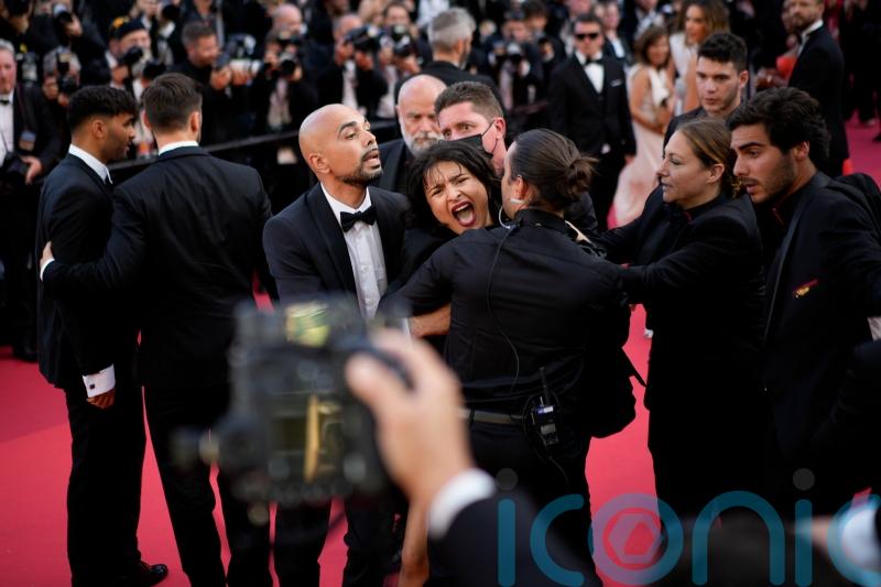 Woman strips off in Ukraine Cannes red carpet protest