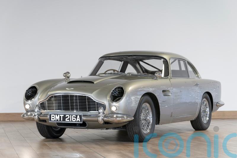 James Bond Aston Martin stunt car sells for huge sum at charity auction