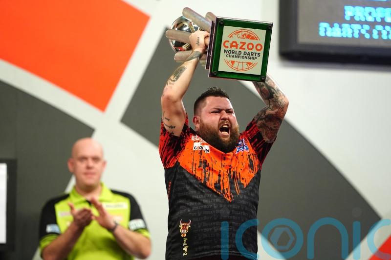 WATCH: Michael Smith throws nine-darter en route to winning maiden World Championship
