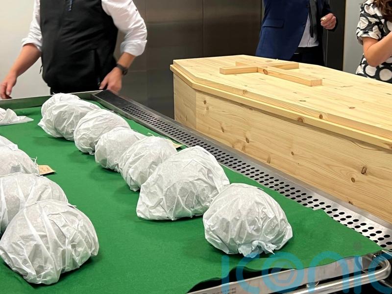 Reburial ceremony held as 400-year-old human skulls returned to Irish island